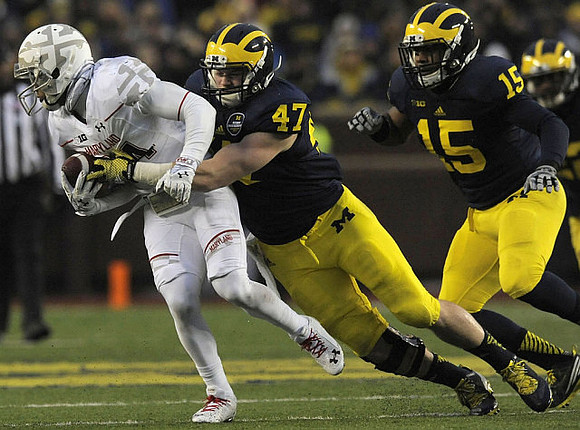 Jake Ryan (47) and James Ross (15)
