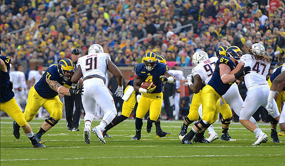 Bo Dever (3), Ben Braden (71), De'Veon Smith (4), and Kyle Kalis (67)