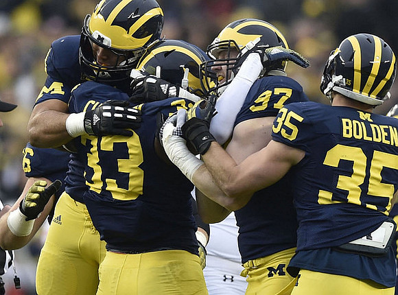 Taco Charlton (33), Brennen Beyer (97), and Joe Bolden (35)