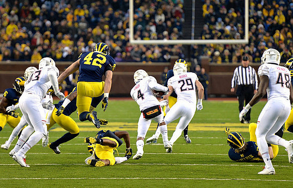 Raymon Taylor (6) and Ben Gedeon (42)