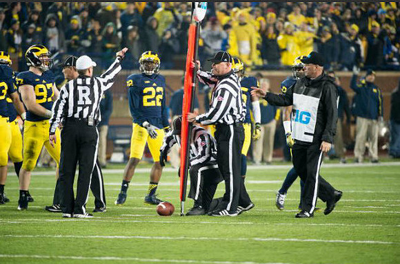 Brennen Beyer (97) and Jourdan Lewis (26)