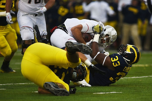 Taco Charlton (33) and Chris Wormley (43)