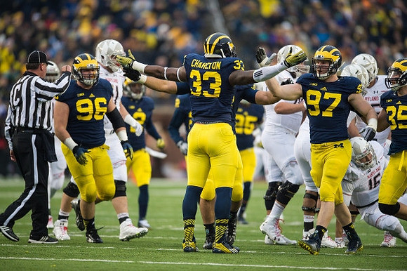 Ryan Glasgow (96), Taco Charlton (33), Brennen Beyer (97), and Joe Bolden (35)