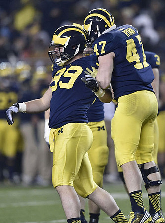 Matthew Godin (99) and Jake Ryan (47)