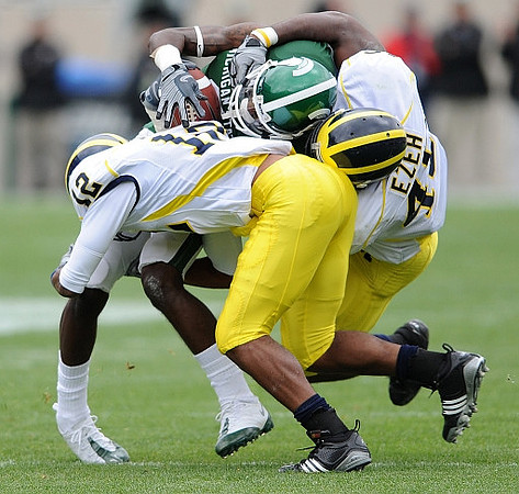 J.T. Floyd (12) and Obi Ezeh (45)