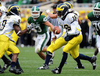 Martavious Odoms (9) and Denard Robinson (16)