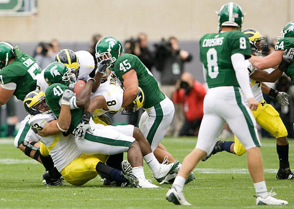 Ryan Van Bergen (53), Stevie Brown (3), Jonas Mouton (8), and Michael Williams (40)
