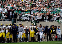Darryl Stonum (22), Brandon Graham (55) and Stephen Schilling (52)