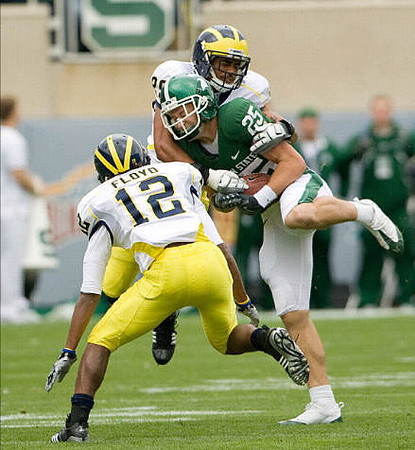 J.T. Floyd (12) and Troy Woolfolk (29)