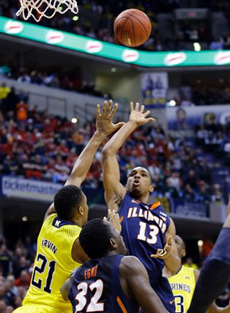 Zak Irvin (21) and Caris LeVert (23)