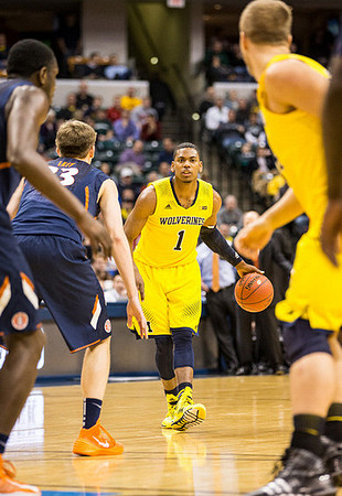 Nik Stauskas (11) and Jordan Morgan (52)