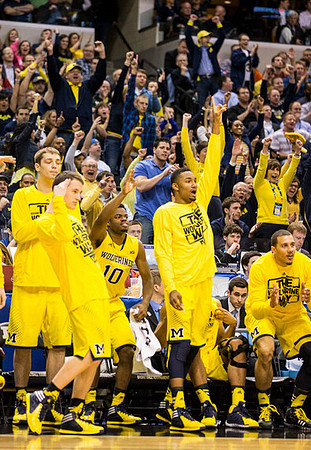 Nik Stauskas (11) and Jordan Morgan (52)