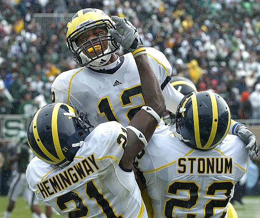 Junior Hemingway (21), Roy Roundtree (12), and Darryl Stonum (22)