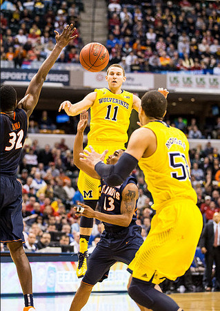Glenn Robinson III (1) and Nik Stauskas (11)