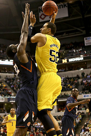 Jordan Morgan (52) and Nik Stauskas (11)