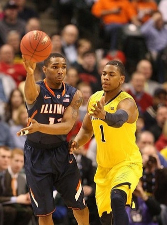Glenn Robinson III (1), Jordan Morgan (52), Caris LeVert (23), Nik Stauskas (11), Derrick Walton Jr. (10), John Beilein, and Bacari Alexander