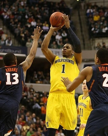 Jon Horford (15) and Glenn Robinson III (1)