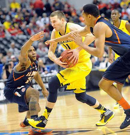 Nik Stauskas (11) and Caris LeVert (23)