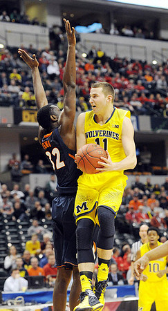 Nik Stauskas (11) and Derrick Walton Jr. (10)