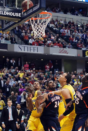 Caris LeVert (23) and Jordan Morgan (52)