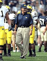 Lloyd Carr, Mister Simpson, and Carlos Brown