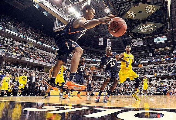 Glenn Robinson III (1) and John Beilein