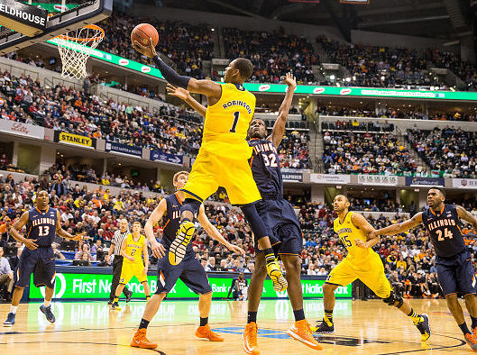 Derrick Walton Jr. (10) and Nik Stauskas (11)