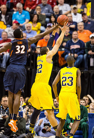 Caris LeVert (23) and Glenn Robinson III (1)