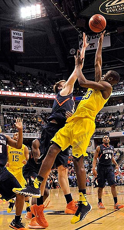 Sean Lonergan (20), Caris LeVert (23), Nik Stauskas (11), Bacari Alexander, John Beilein, LaVall Jordan, and Glenn Robinson III (1)