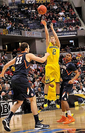 Caris LeVert (23) and Glenn Robinson III (1)