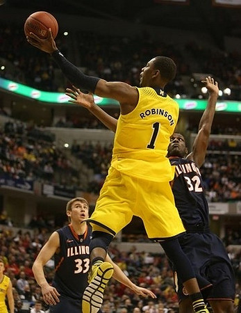 Andrew Dakich (5) and Mitch McGary (4)
