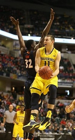 Jordan Morgan (52) and Glenn Robinson III (1)
