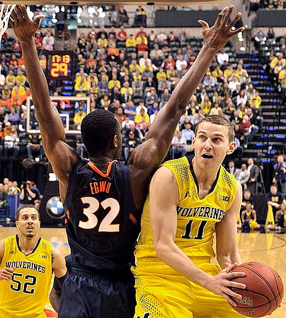John Beilein, LaVall Jordan, Bacari Alexander, and Jeff Meyer