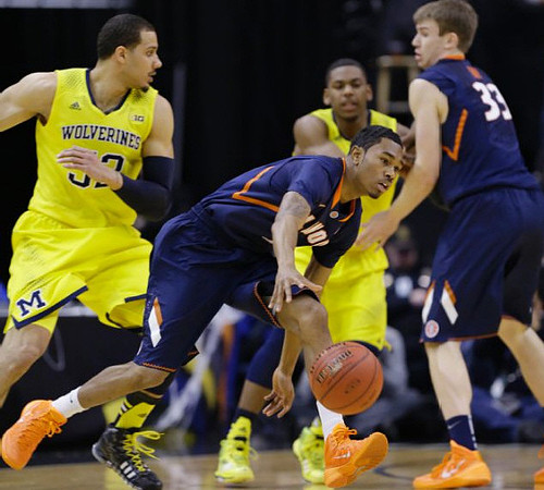 Jordan Morgan (52) and Glenn Robinson III (1)