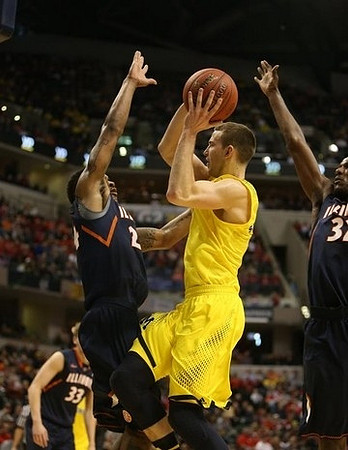 Jordan Morgan (52) and Caris LeVert (23)