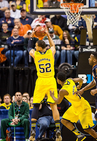 Jordan Morgan (52) and Caris LeVert (23)