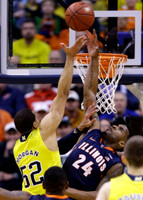Jordan Morgan (52) and Nik Stauskas (11)