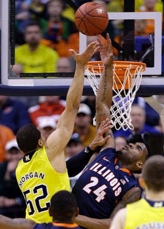 Jordan Morgan (52) and Nik Stauskas (11)