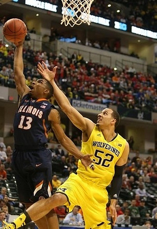 Sean Lonergan (20) and Mitch McGary (4)