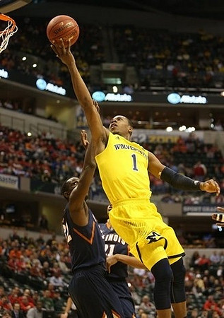 Glenn Robinson III (1), Caris LeVert (23), Jordan Morgan (52), and Nik Stauskas (11)