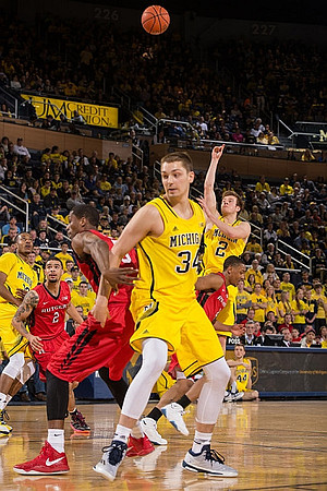 Muhammad-Ali Abdur-Rahkman (12), Mark Donnal (34), and Spike Albrecht (2)