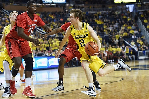 Mark Donnal (34) and Spike Albrecht (2)