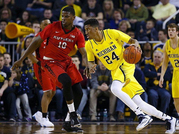 Aubrey Dawkins (24) and Spike Albrecht (2)
