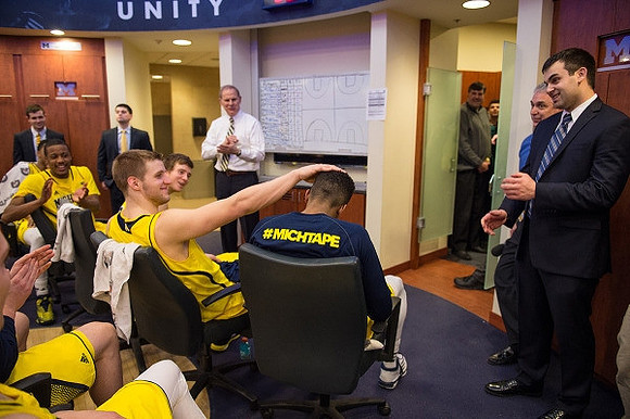 Max Bielfeldt (44), John Beilein, and Michigan Team