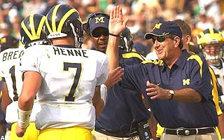 Lloyd Carr, Steve Breaston, and Chad Henne