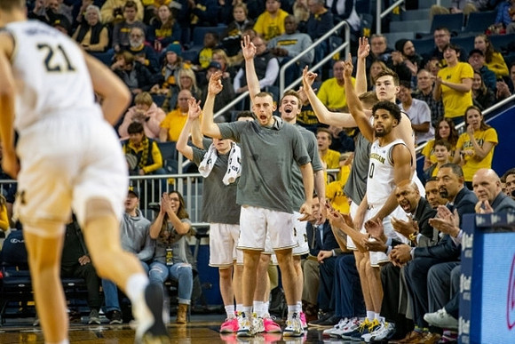 Franz Wagner (21) and Michigan Team