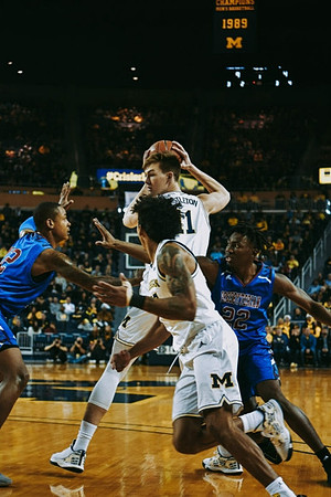 Colin Castleton (11) and Eli Brooks (55)