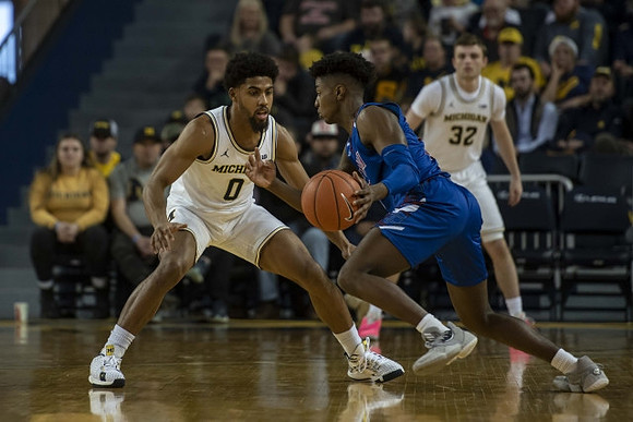 David DeJulius (0) and Luke Wilson (32)