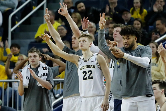 Luke Wilson (32), Jaron Faulds (44), Cole Bajema (22), Jon Teske (15), and Isaiah Livers (2)