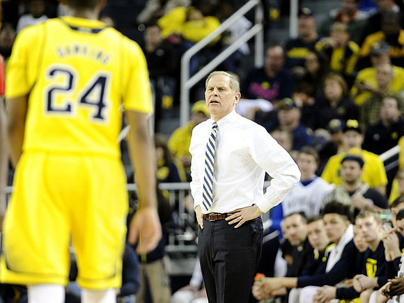 Aubrey Dawkins (24) and John Beilein